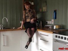 Red Porn Strips And Fingers Her Pussy In The Kitchen